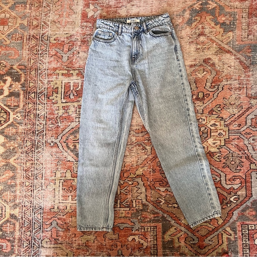 12th Tribe denim. Mom fit and ankle length.